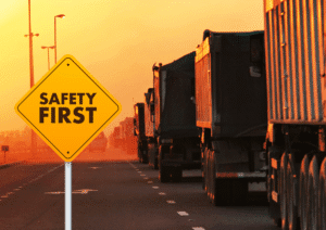 Ilustrasi truk di jalan raya.